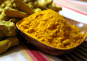 ground and whole turmeric
